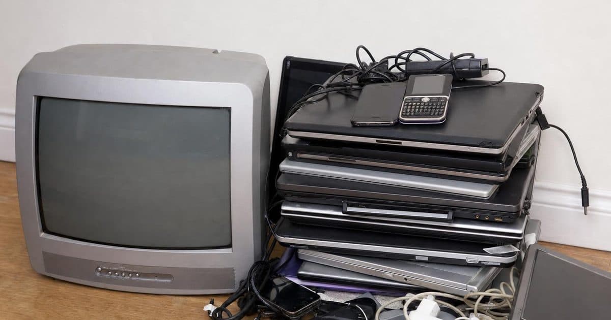 Old electronic devices and cables sorted for recycling in Bromley